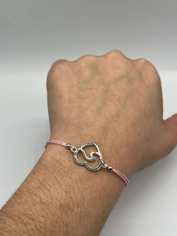 Pulsera ajustable enchapada en plata con cuerda rosa amuleto onda en corazón paquete de 12 Foto 4 de 4