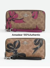 NWT Coach Long Zip Around Wallet In Signature Canvas With Bow Print CZ326