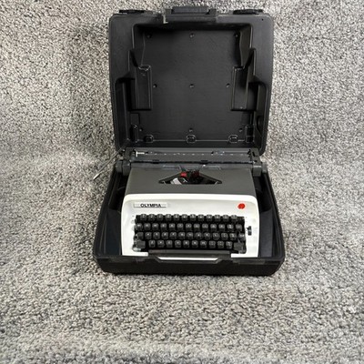 Vintage 1971 Olympia B12 Deluxe tragbare Schreibmaschine mit Koffer Top Zustand