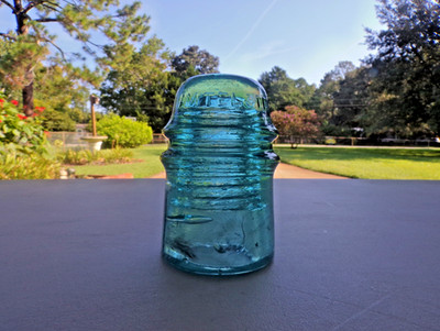 Nice A M T E L. & T E L. Co. Glass Insulator.