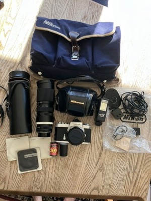 Nikon Nikkormat FTN 35 mm Camera with Additional lens, leather cases, & extras