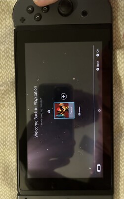 nintendo switch version 1 with gray joycon JB. **minor scratches