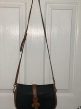 Vintage Dooney  Bourke Black and Brown All Weather Leather Flap Crossbody Bag