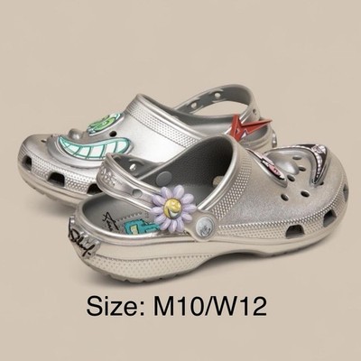 CROCS KENNY SCHARF SIZE M10/W12 NEW SILVER