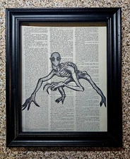 Skinwalker Upcycled Dictionary Art