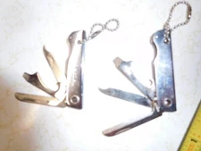 2 Vintage Un-Used Trim-Trio 4 Tool Nail File, Bottle Opener, ScrewD. & Knife