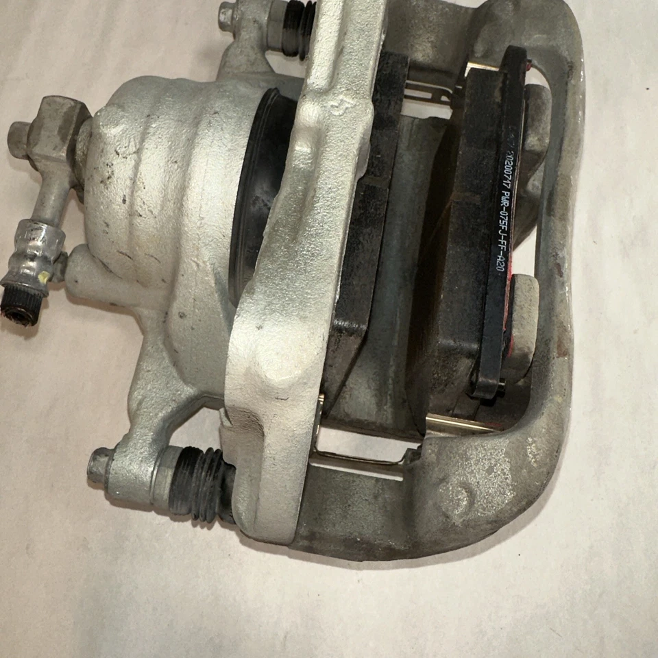 Chevrolet Volt 2011-2015 tracción delantera izquierda lado del pasajero ABS pinza de freno OEM Foto 3 de 4