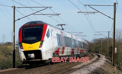 PHOTO  CLASS 745 LOCO 755 104   GREATER ANGLIA PASSENGER MULTIPLE UNITS AT BRANT