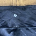 Women’s RARE Lululemon Black On Black Logo Leggings Size 2 length 23 Inch — photo 5