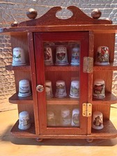 15 Vintage Thimbles In A Display Cabinet