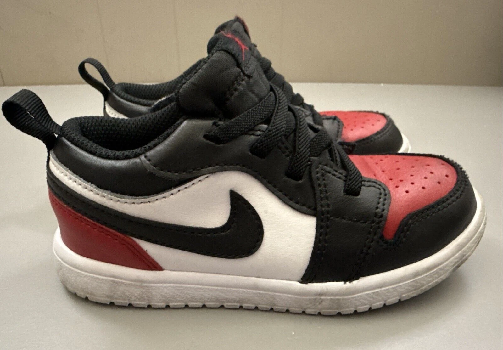 Scarpe Jordan 1 Low (GS) bambino taglia 10C bianco nero rosso variegato DR9747 161