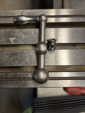Bridgeport X axis safety handle assembly