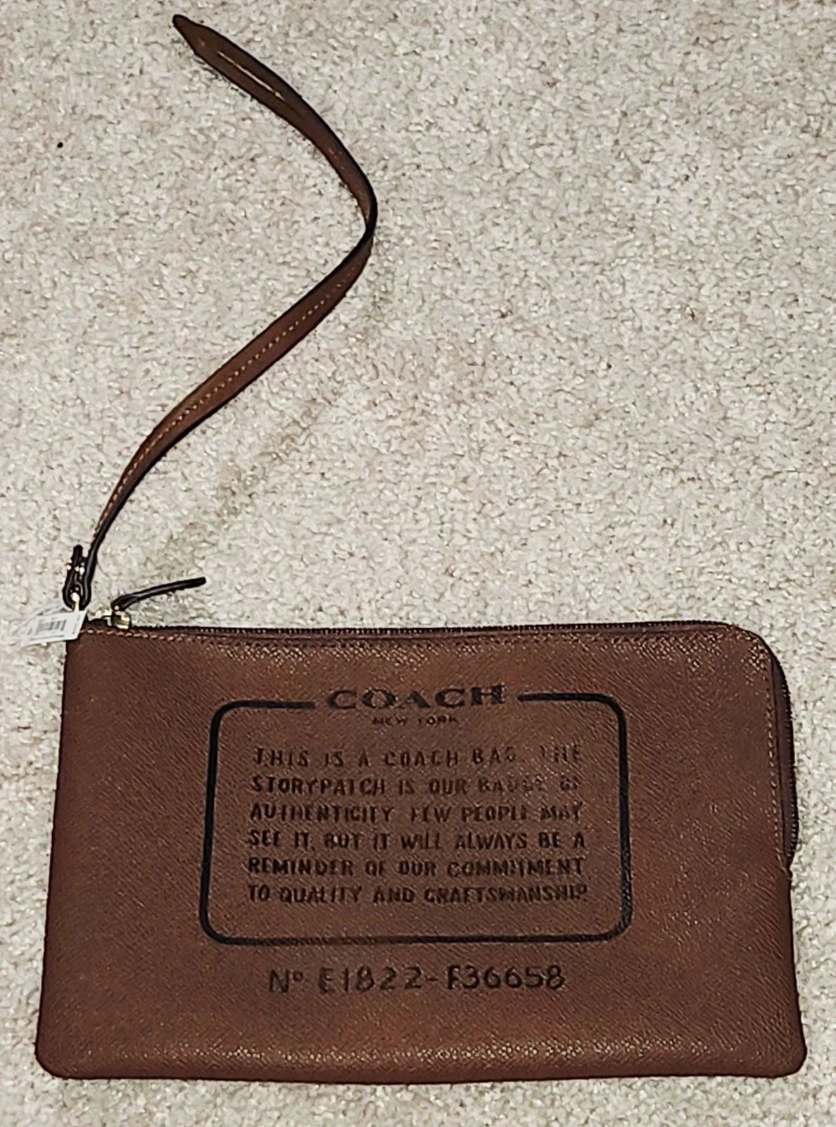 Storypatch Coach Marsupio da Polso Grande Logo Scritta Pelle Marrone Nuovo con etichette