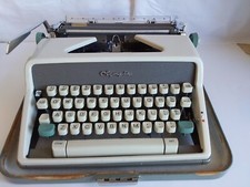 Vintage Olympia Deluxe Manual Typewriter With Case thumbnail