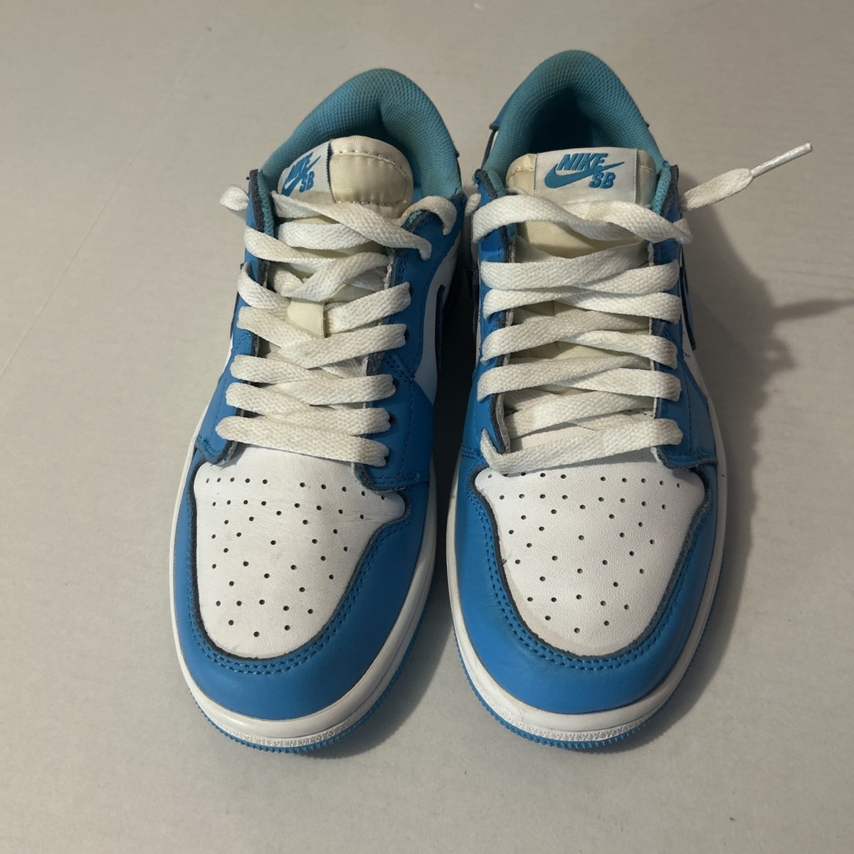 air jordan 1 low sb unc powder blue & white