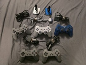 Sony PlayStation 1 System With 5 Controllers, 1 Memory Card, 1 Game, Ganeshark