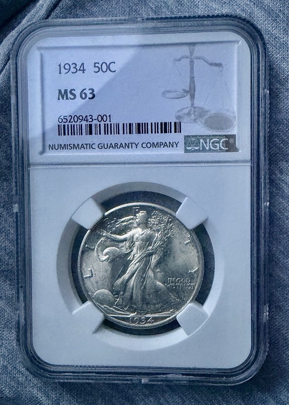 1934- Walking Liberty NGC MS 63-Silver Half Dollar. Nice Strike. Lustrous.