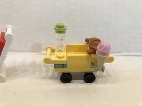 2 Lego Friends Minifigures: Stepanie & Nate (Hotel Boy) from 41101 Grand Hotel