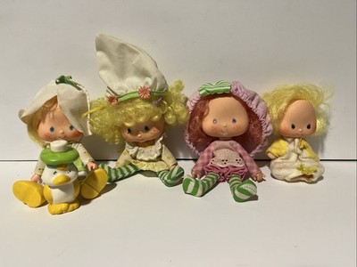Lot of 4 Strawberry Shortcake Dolls and One Pet Good Used Condition