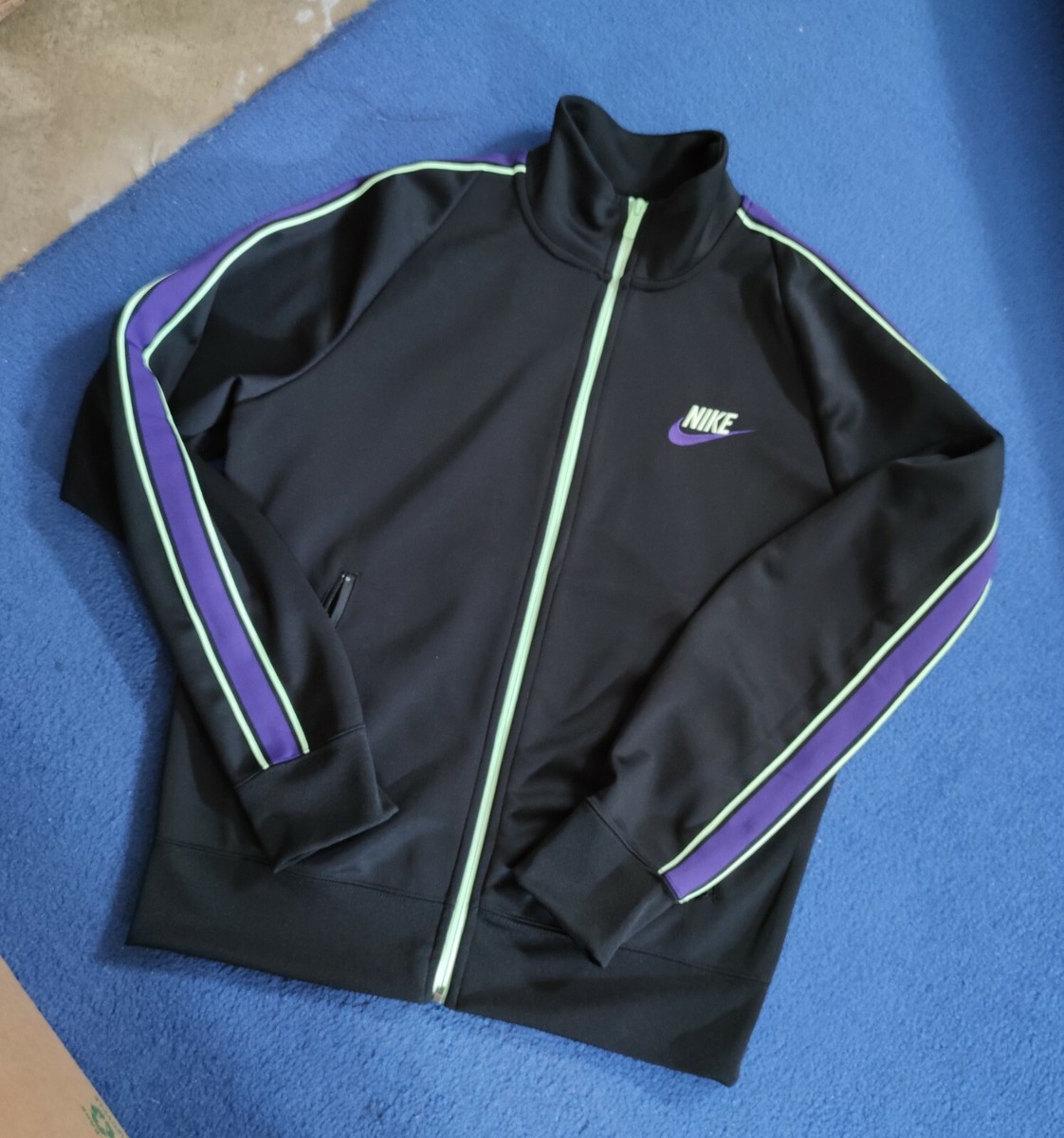 nike evolution of the swoosh jacket