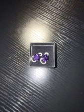 Absolutely Beautiful Earrings With A Purple Gemstone. ￼￼