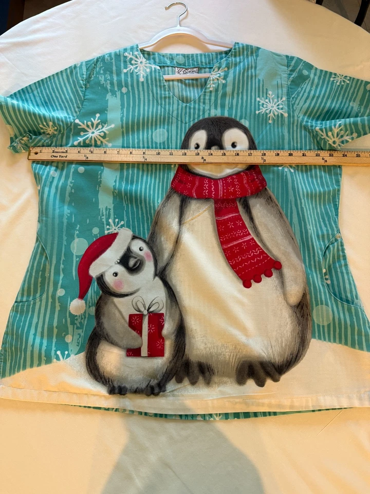 UNIFORME NAVIDAD EXFOLIANTE TOP UA EXFOLIANTE PENQUIN/PEQUEÑO PENQUIN EXCELENTE USADO (G-9) Foto 3 de 4