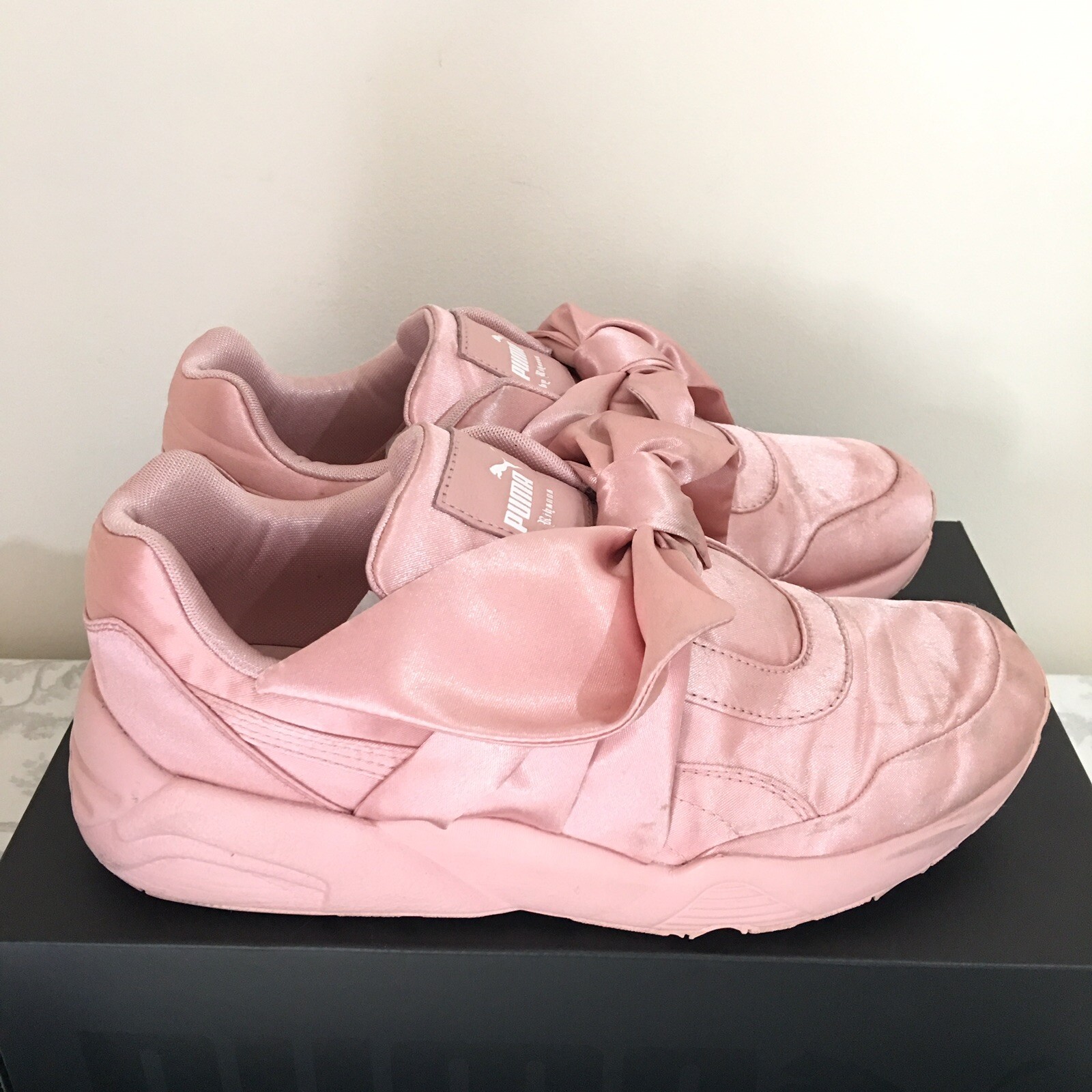 pink pumas with bow