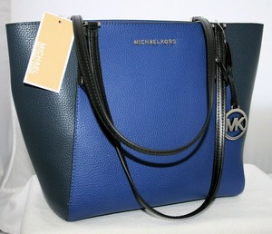 blue and black michael kors purse