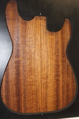 Figured quarter sawn zebrawood guitar drop top.