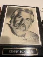 ￼ Kenny Rogers autographed photo ￼
