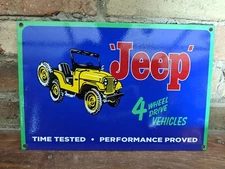 VINTAGE JEEP 4 WHEEL DRIVE VEICLES PORCELAIN METAL ADVERTISING SIGN.