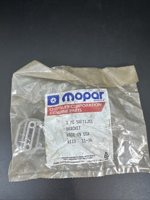 NOS MOPAR 5AF71JS1 1987-94 JEEP CARGO COVER BRACKET