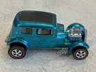 Hot Wheels Redline Classic ‘32 Ford Vicky, #6250, in glowing Aqua Spectraflame.