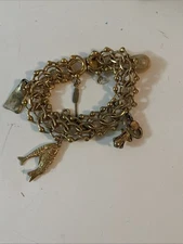 Vintage Soba Diving Charm Bracelet Gold Tone Monet