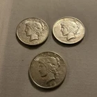 One 1922 and Two 1923 peace dollars lot