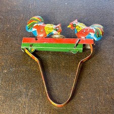 Vintage Tin Plate Hand Held Toy The Pecking Roosters
