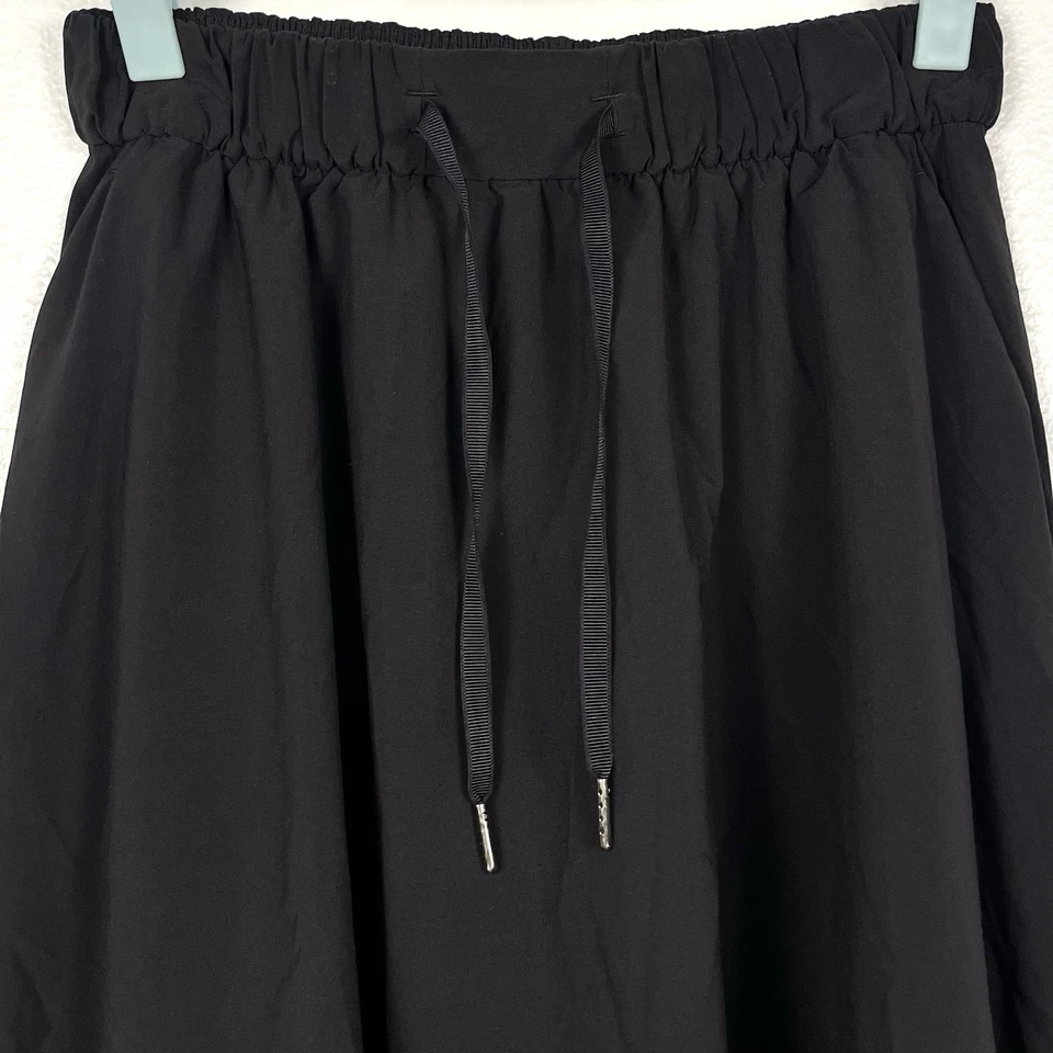 Falda midi Lululemon Time To Flounce negra alta-baja talla 4 Foto 2 de 4