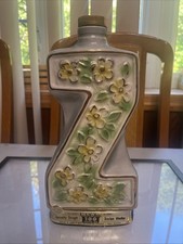 VINTAGE 1970 JIM BEAM PORCELAIN "Z" DECORATED W/ RAISED YELLOW & GREEN FLOWERS