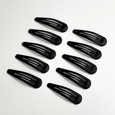 10 simple black hair clips, designed for women to use for styling their hair.