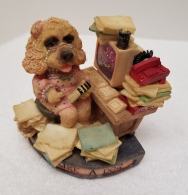 Dog Gone working like a dog Designed by David Olsen 1998 Enesco cor. 348872