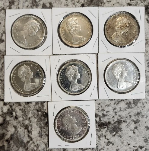 Lot Of 7 Canada  Dollar Flying Goose 6 1967 Silver Coins And 1 Charlottetown