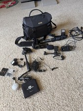 Canon VIXIA HF R50 WiFi HD Camcorder Bundle Mic, Light,Charger, Case,Accessories