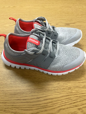 Reebok sub lite running shoes /Women's size 7.5/ Color grey white and light red