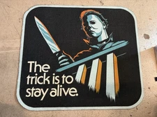 Creepy Co. Halloween Myers “The Trick Is to Stay Alive” Rug Area Rug