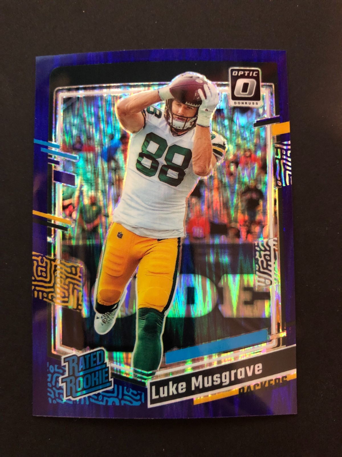2023 Donruss Optic Luke Musgrave Purple Shock Prizm Rated Rookie #241 Packers