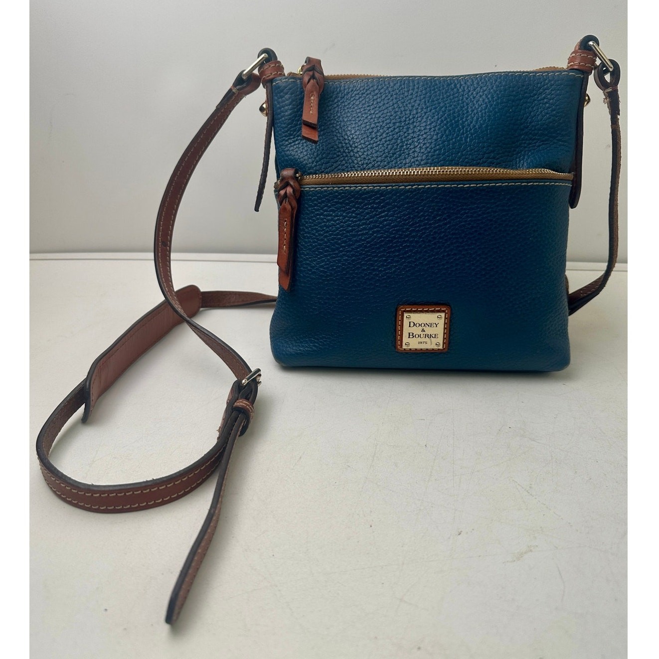 Dooney & Bourke Blue Pebble Grain Leather Letter Carrier Crossbody Bag
