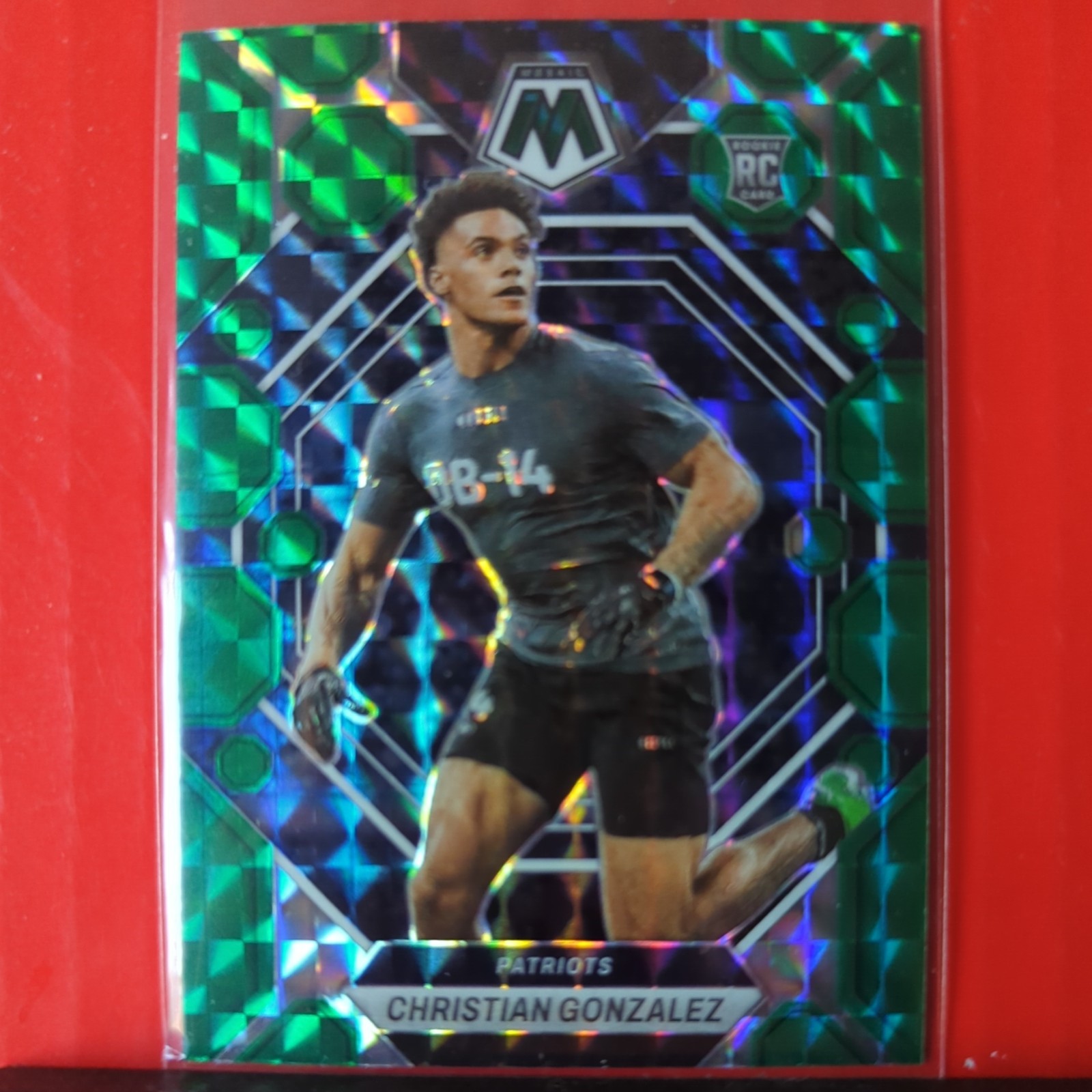 2023 Panini Mosaic Christian Gonzalez (RC) #300 Green Prizm New England Patriots