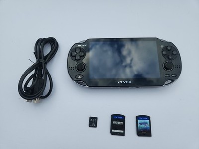Sony PS Vita PCH-1001 OLED Console Bundle - Works Great- 4GB Card & 2 Games Case