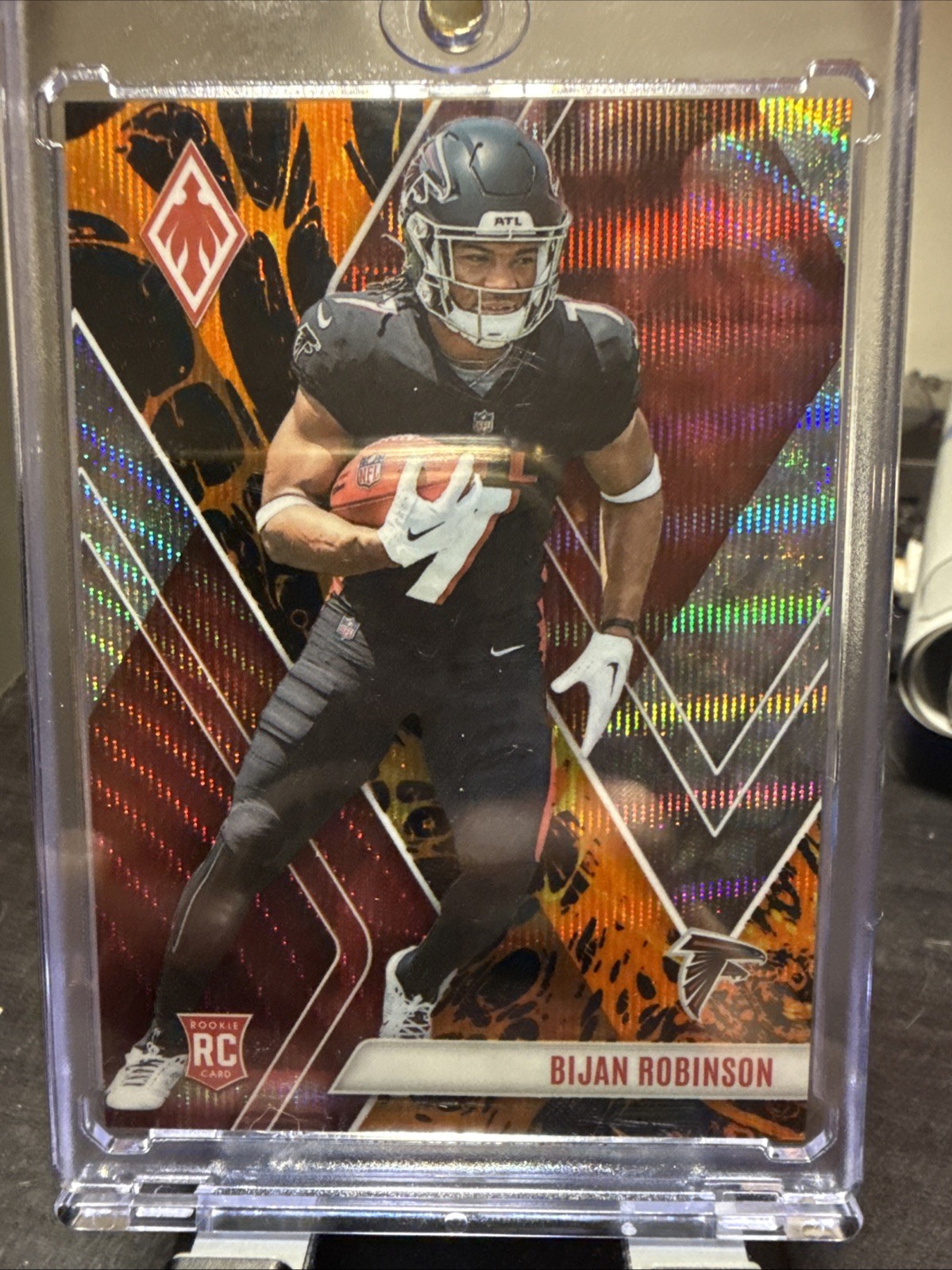 2023 Panini Phoenix - Rookies Bijan Robinson #104 Lava /175 (RC)