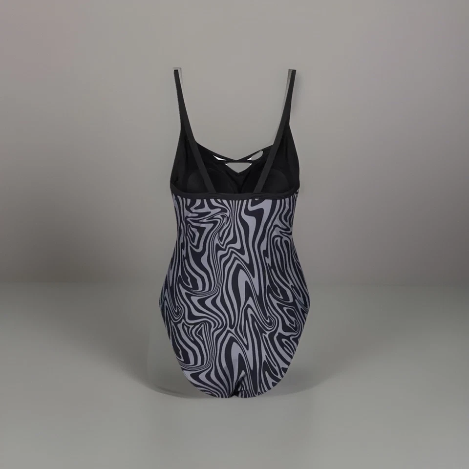 Traje de baño Reebok 1 pieza en negro estampado animal PVP £24,99 Foto 3 de 4